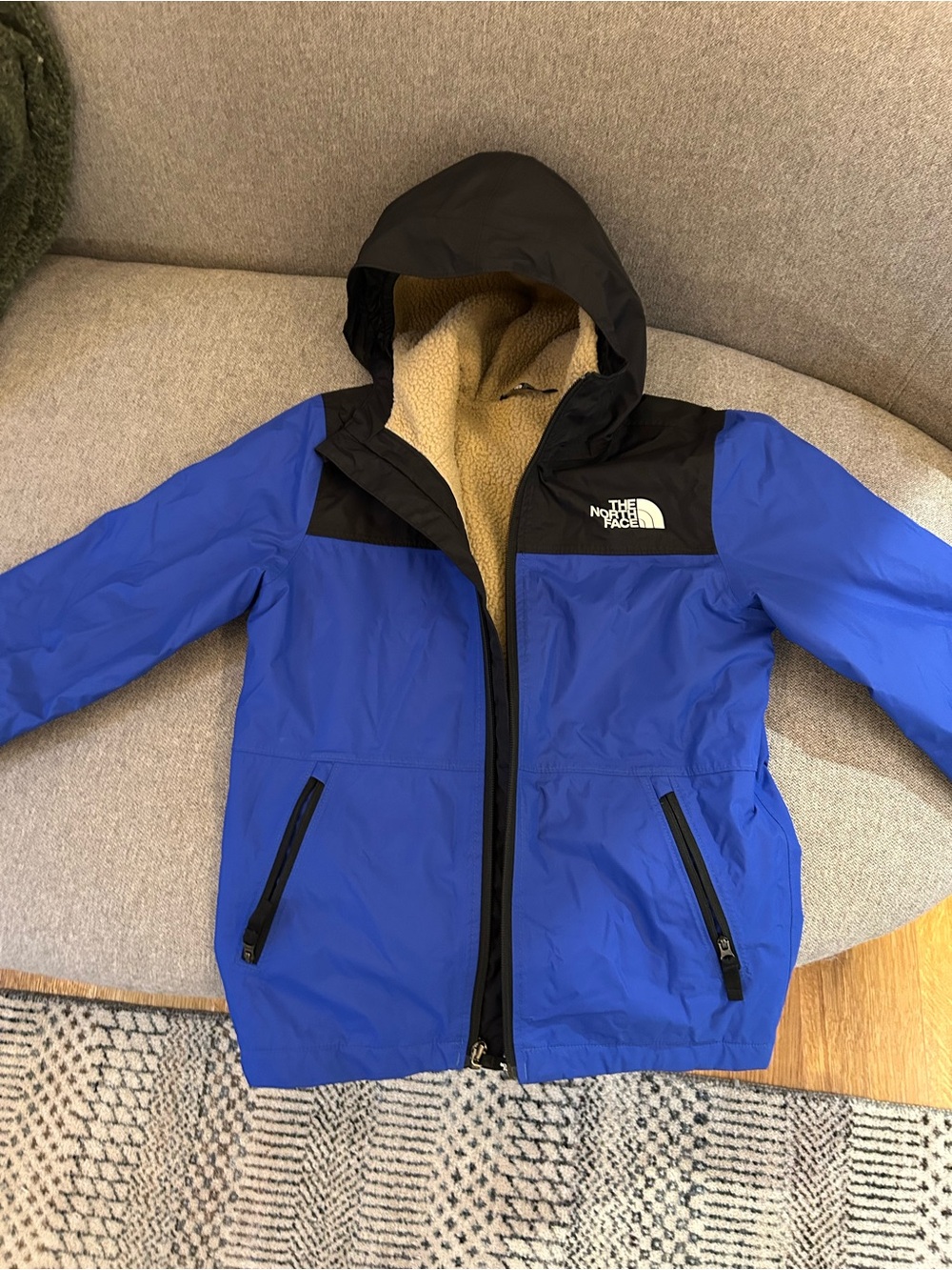 The North Face Blue and Black Kids' Warm Storm Hoode Raincoat with Fleece Lining